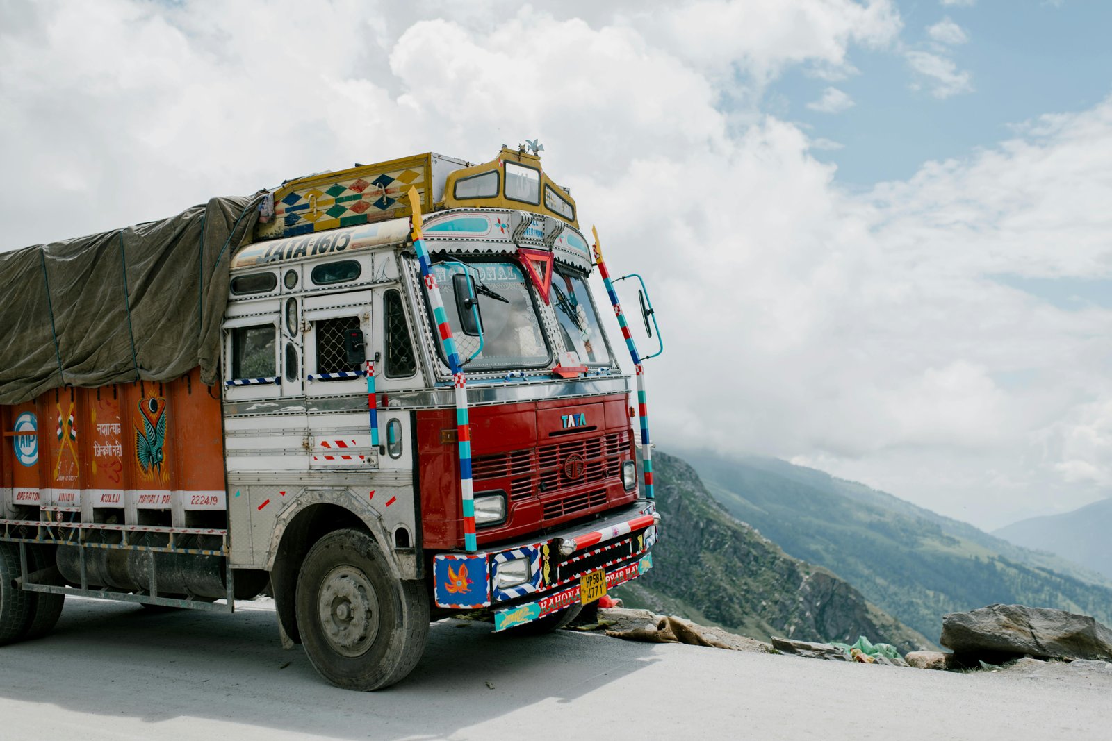 Indian transport truck carrying tarpaulin-covered cargo